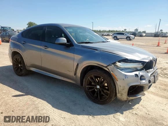 ✅ 2016 BMW X6 xDrive35i • VIN: 5UXKU2C5XG0N80740 • Lot: 71428885. Listed on Copart with 62,897 mi. Free auction sales archive from the USA and detailed vehicle history report at DreamBid. Image 4.