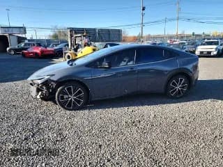 ✅ 2024 Toyota Prius LE • VIN: JTDADABU6R3012177 • Лот: 62894455. Опубликован ранее на Copart с пробегом 5 993 миль. Бесплатный доступ к архиву аукционных продаж из США и подробный отчёт об истории автомобиля на DreamBid. Изображение 1.