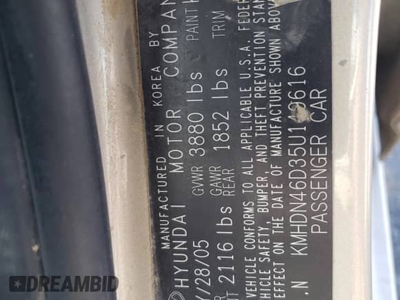 2005 Hyundai Elantra GLS z VIN KMHDN46D35U149616, wystawiony jako Copart lot #81009975 z przebiegiem 233 904 mil mil oraz Szkoda całkowita • Salvage title. Historia ofert i sprzedaży dostępna na DreamBid. Obrazek 12.