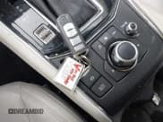 ✅ 2017 Mazda CX-5 Grand Touring • VIN: JM3KFBDLXH0120415 • Lot: 43472310. Wystawiony na IAAI z przebiegiem 95 641 mil. Bezpłatny archiwum sprzedaży aukcyjnych z USA i szczegółowy raport historii pojazdu na DreamBid. Zdjęcie 11.