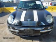 ✅ 2002 MINI Hardtop • VIN: WMWRC33402TC32985 • Lot: 42608636. Listed on IAAI with 159,996 mi. Free auction sales archive from the USA and detailed vehicle history report at DreamBid. Image 6.