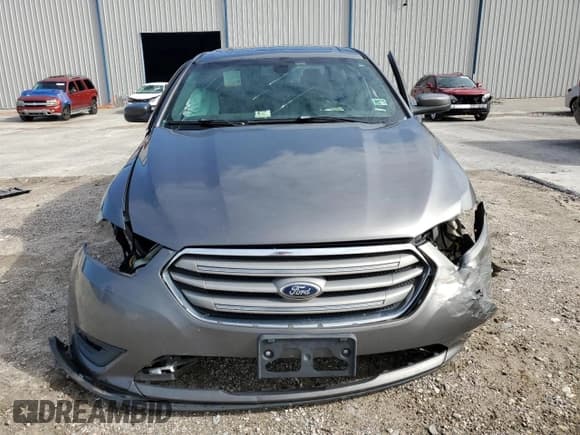 ✅ 2014 Ford Taurus SEL • VIN: 1FAHP2E80EG167679 • Лот: 75125764. Опубликован ранее на Copart с пробегом 186 502 миль. Бесплатный доступ к архиву аукционных продаж из США и подробный отчёт об истории автомобиля на DreamBid. Изображение 5.