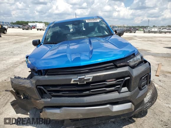 ✅ 2023 Chevrolet Colorado 4WD Trail Boss • VIN: 1GCPTEEK2P1208916 • Лот: 68089094. Опубликован ранее на Copart с пробегом Не указан. Бесплатный доступ к архиву аукционных продаж из США и подробный отчёт об истории автомобиля на DreamBid. Изображение 5.