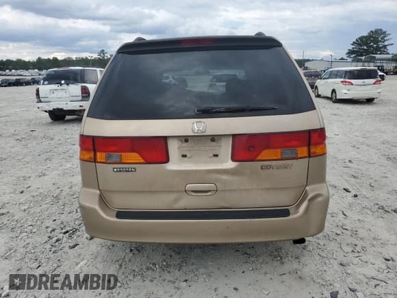 ✅ 2002 Honda Odyssey EX-L • VIN: 2HKRL189X2H586400 • Lot: 82102575. Listed on Copart with 263,380 mi. Free auction sales archive from the USA and detailed vehicle history report at DreamBid. Image 6.