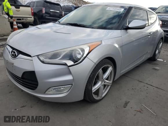✅ 2013 Hyundai Veloster w/Black Int • VIN: KMHTC6AD0DU152511 • Lot: 42768545. Listed on Copart with 93,438 mi. Free auction sales archive from the USA and detailed vehicle history report at DreamBid. Image 1.