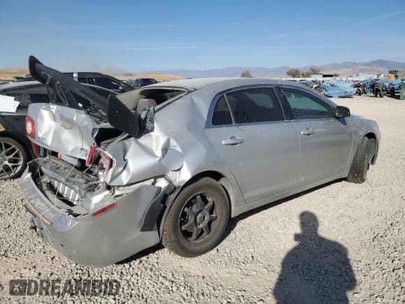 ✅ 2010 Chevrolet Malibu 1FL • VIN: 1G1ZA5E02AF106290 • Lot: 74611934. Listed on Copart with 143,823 mi. Free auction sales archive from the USA and detailed vehicle history report at DreamBid. Image 3.