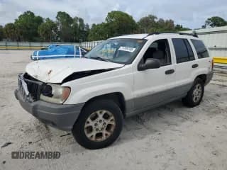 ✅ 2002 Jeep Grand Cherokee Laredo • VIN: 1J4GX48SX2C313897 • Lot: 71789765. Listed on Copart with 149,576 mi. Free auction sales archive from the USA and detailed vehicle history report at DreamBid. Image 1.