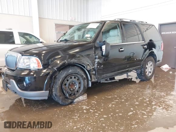 ✅ 2004 Lincoln Navigator Luxury • VIN: 5LMFU28R24LJ32994 • Lot: 41264240. Listed on IAAI with 210,421 mi. Free auction sales archive from the USA and detailed vehicle history report at DreamBid. Image 2.