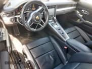 ✅ 2017 Porsche 911 Carrera • VIN: WP0CA2A99HS141149 • Лот: 65654645. Опубликован ранее на Copart с пробегом 39 694 миль. Бесплатный доступ к архиву аукционных продаж из США и подробный отчёт об истории автомобиля на DreamBid. Изображение 8.