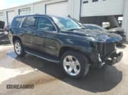 ✅ 2015 Chevrolet Tahoe LTZ • VIN: 1GNSCCKC3FR633581 • Lot: 65729215. Listed on Copart with 135,551 mi. Free auction sales archive from the USA and detailed vehicle history report at DreamBid. Image 4.