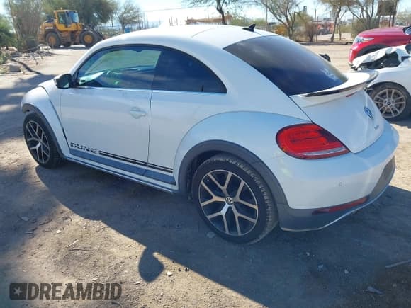 ✅ 2016 Volkswagen Beetle Dune • VIN: 3VWS17AT8GM632868 • Lot: 43810321. Listed on IAAI with 75,311 mi. Free auction sales archive from the USA and detailed vehicle history report at DreamBid. Image 3.