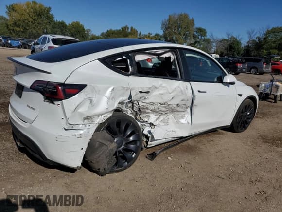 ✅ 2022 Tesla Model Y Performance • VIN: 7SAYGDEF3NF522104 • Lot: 85723415. Listed on Copart with 23,136 mi. Free auction sales archive from the USA and detailed vehicle history report at DreamBid. Image 3.