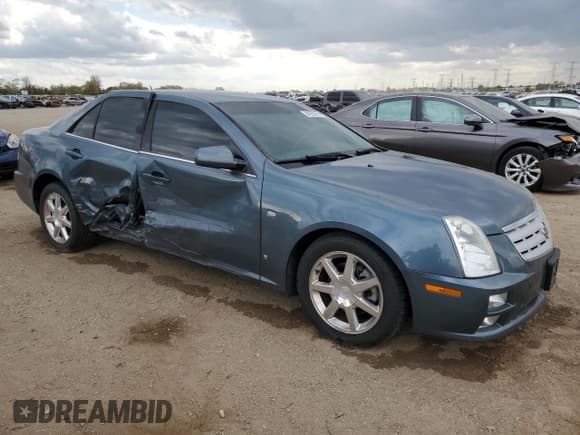 ✅ 2006 Cadillac STS • VIN: 1G6DW677560217318 • Lot: 84292475. Listed on Copart with 105,559 mi. Free auction sales archive from the USA and detailed vehicle history report at DreamBid. Image 4.