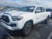 ✅ 2021 Toyota Tacoma SR5 • VIN: 3TMAZ5CN7MM146297 • Lot: 43760118. Listed on IAAI with 46,809 mi. Free auction sales archive from the USA and detailed vehicle history report at DreamBid. Image 2.
