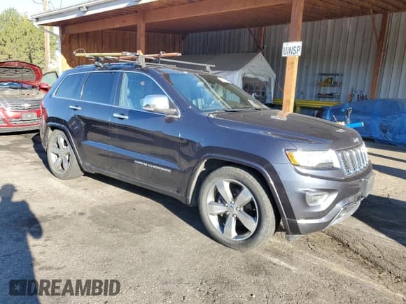✅ 2014 Jeep Grand Cherokee Overland • VIN: 1C4RJFCG9EC431684 • Lot: 84038665. Listed on Copart with 140,795 mi. Free auction sales archive from the USA and detailed vehicle history report at DreamBid. Image 4.