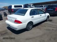 ✅ 2003 Mitsubishi Lancer ES • VIN: JA3AJ26E43U005990 • Lot: 42789252. Wystawiony na IAAI z przebiegiem 164 692 mil. Bezpłatny archiwum sprzedaży aukcyjnych z USA i szczegółowy raport historii pojazdu na DreamBid. Zdjęcie 4.