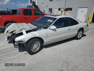 ✅ 1993 Lincoln Mark VIII • VIN: 1LNLM91V9PY657743 • Lot: 61233595. Listed on Copart with 117,552 mi. Free auction sales archive from the USA and detailed vehicle history report at DreamBid. Image 1.