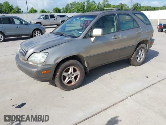 ✅ 2001 Lexus RX 300 • VIN: JTJGF10UX10113863 • Lot: 42455576. Listed on IAAI with Not provided. Free auction sales archive from the USA and detailed vehicle history report at DreamBid. Image 2.