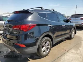 ✅ 2018 Hyundai Santa Fe 2.4L • VIN: 5NMZU3LBXJH063344 • Лот: 50989663. Опубликован ранее на Copart с пробегом 77 620 миль. Бесплатный доступ к архиву аукционных продаж из США и подробный отчёт об истории автомобиля на DreamBid. Изображение 3.