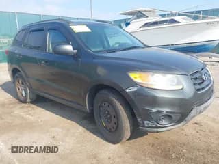 ✅ 2010 Hyundai Santa Fe GLS • VIN: 5NMSG3AB8AH360270 • Lot: 42933303. Listed on IAAI with 173,763 mi. Free auction sales archive from the USA and detailed vehicle history report at DreamBid. Image 1.