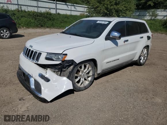 ✅ 2014 Jeep Grand Cherokee Summit • VIN: 1C4RJFJG2EC214092 • Lot: 70781765. Listed on Copart with 235,693 mi. Free auction sales archive from the USA and detailed vehicle history report at DreamBid. Image 1.