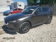 ✅ 2019 Mazda CX-5 Touring • VIN: JM3KFACM5K1567949 • Lot: 90634185. Listed on Copart with 127,293 mi. Free auction sales archive from the USA and detailed vehicle history report at DreamBid. Image 1.