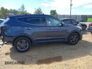 ✅ 2018 Hyundai Santa Fe 2.4L • VIN: 5NMZUDLBXJH059736 • Лот: 43445713. Опубликован ранее на IAAI с пробегом 138 393 миль. Бесплатный доступ к архиву аукционных продаж из США и подробный отчёт об истории автомобиля на DreamBid. Изображение 14.