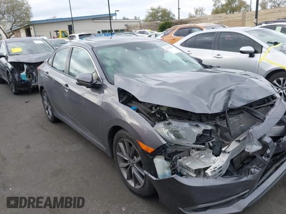 ✅ 2019 Honda Civic EX • VIN: 19XFC1F34KE208482 • Lot: 43760107. Listed on IAAI with 71,283 mi. Free auction sales archive from the USA and detailed vehicle history report at DreamBid. Image 13.