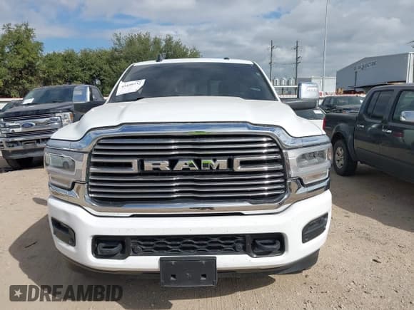 ✅ 2023 Ram 2500 Laramie • VIN: 3C6UR5FL4PG588486 • Lot: 43459732. Listed on IAAI with 54,339 mi. Free auction sales archive from the USA and detailed vehicle history report at DreamBid. Image 12.