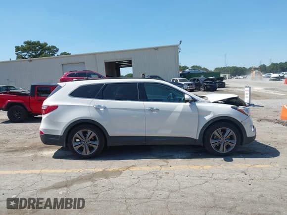 ✅ 2014 Hyundai Santa Fe GLS • VIN: KM8SN4HF5EU072835 • Лот: 43180919. Опубликован ранее на IAAI с пробегом 193 438 миль. Бесплатный доступ к архиву аукционных продаж из США и подробный отчёт об истории автомобиля на DreamBid. Изображение 13.