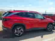 2022 Hyundai Tucson SEL z VIN 5NMJFCAE7NH096781, wystawiony jako IAAI lot #43109979 z przebiegiem 58 636 mil mil oraz . Historia ofert i sprzedaży dostępna na DreamBid. Obrazek 13.