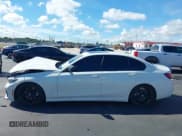 ✅ 2022 BMW 3 Series 330i • VIN: 3MW5R1J06N8C36565 • Lot: 43248730. Listed on IAAI with 49,037 mi. Free auction sales archive from the USA and detailed vehicle history report at DreamBid. Image 14.