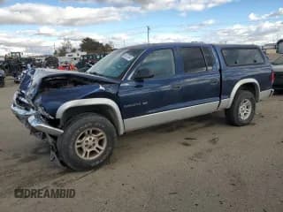 ✅ 2001 Dodge Dakota Sport • VIN: 1B7GG2ANX1S159436 • Lot: 80347854. Wystawiony na Copart z przebiegiem 203 253 mil. Bezpłatny archiwum sprzedaży aukcyjnych z USA i szczegółowy raport historii pojazdu na DreamBid. Zdjęcie 1.