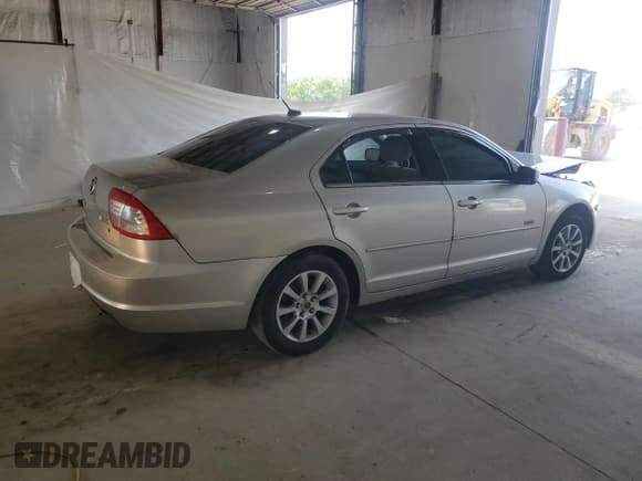 ✅ 2007 Mercury Milan • VIN: 3MEHM01187R620196 • Lot: 60523615. Listed on Copart with 104,678 mi. Free auction sales archive from the USA and detailed vehicle history report at DreamBid. Image 3.