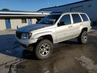 ✅ 2003 Jeep Grand Cherokee Limited • VIN: 1J4GW58N23C524189 • Лот: 93212415. Опубликован ранее на Copart с пробегом 200 964 миль. Бесплатный доступ к архиву аукционных продаж из США и подробный отчёт об истории автомобиля на DreamBid. Изображение 1.