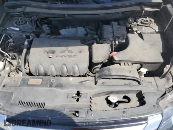 2018 Mitsubishi Outlander ES with VIN JA4AZ3A39JZ027175, listed as a Copart auction lot 70573725 with 197,576 mi miles and Salvage title. Bid and sale history available at DreamBid. Image 12.