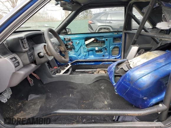 ✅ 1993 Ford Mustang LX • VIN: 1FACP41E3PF159733 • Lot: 43104805. Listed on Copart with 196,695 mi. Free auction sales archive from the USA and detailed vehicle history report at DreamBid. Image 7.