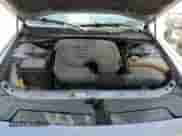 2014 Dodge Challenger SXT z VIN 2C3CDYAG7EH231853, wystawiony jako Copart lot #57032924 z przebiegiem 160 093 mil mil oraz Szkoda całkowita • Salvage title. Historia ofert i sprzedaży dostępna na DreamBid. Obrazek 11.