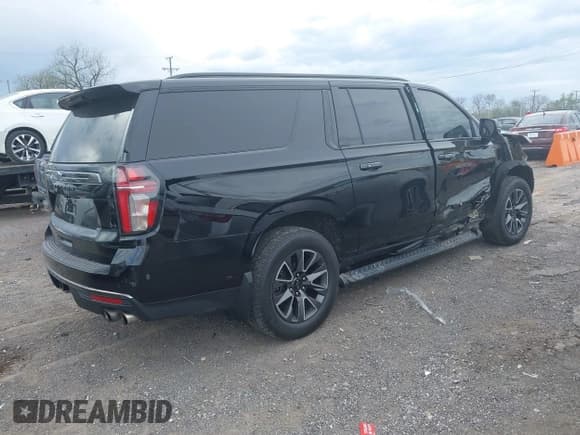 ✅ 2022 Chevrolet Suburban • VIN: 1GNSKDKL5NR218592 • Lot: 41989302. Listed on IAAI with 184,080 mi. Free auction sales archive from the USA and detailed vehicle history report at DreamBid. Image 4.