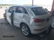 ✅ 2018 Audi Q3 Premium Plus • VIN: WA1JCCFSXJR002867 • Lot: 42612125. Wystawiony na IAAI z przebiegiem 61 773 mil. Bezpłatny archiwum sprzedaży aukcyjnych z USA i szczegółowy raport historii pojazdu na DreamBid. Zdjęcie 3.