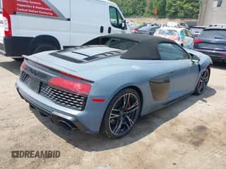 ✅ 2022 Audi R8 Spyder performance • VIN: WUA4BCFX0N7900836 • Lot: 42435601. Wystawiony na IAAI z przebiegiem 12 323 mil. Bezpłatny archiwum sprzedaży aukcyjnych z USA i szczegółowy raport historii pojazdu na DreamBid. Zdjęcie 4.