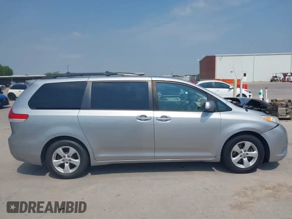 ✅ 2014 Toyota Sienna LE AAS • VIN: 5TDKK3DC7ES510097 • Lot: 43094597. Listed on IAAI with 165,981 mi. Free auction sales archive from the USA and detailed vehicle history report at DreamBid. Image 14.