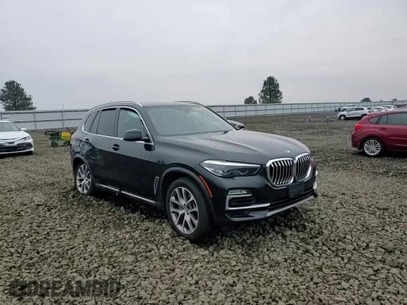 ✅ 2021 BMW X5 xDrive40i • VIN: 5UXCR6C04M9G15820 • Lot: 90668895. Wystawiony na Copart z przebiegiem Nie podano. Bezpłatny archiwum sprzedaży aukcyjnych z USA i szczegółowy raport historii pojazdu na DreamBid. Zdjęcie 14.