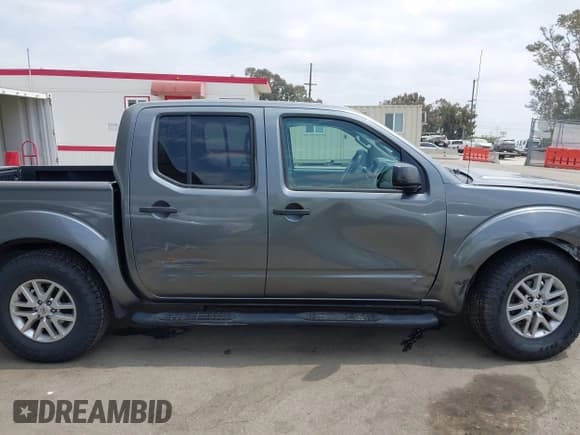 ✅ 2016 Nissan Frontier SV • VIN: 1N6AD0ER5GN751122 • Lot: 42114831. Listed on IAAI with 155,023 mi. Free auction sales archive from the USA and detailed vehicle history report at DreamBid. Image 14.