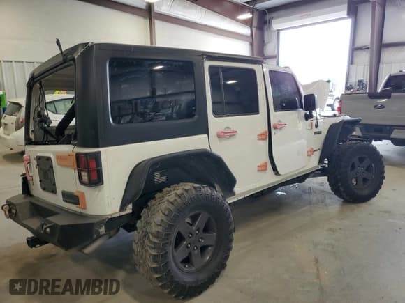 ✅ 2016 Jeep Wrangler Unlimited Freedom • VIN: 1C4BJWDG9GL199557 • Lot: 59421835. Listed on Copart with 171,838 mi. Free auction sales archive from the USA and detailed vehicle history report at DreamBid. Image 3.