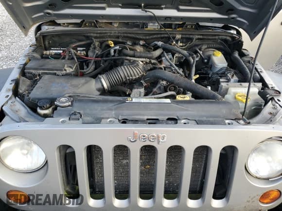 ✅ 2008 Jeep Wrangler X • VIN: 1J4FA24168L601679 • Лот: 81061885. Опубликован ранее на Copart с пробегом 70 649 миль. Бесплатный доступ к архиву аукционных продаж из США и подробный отчёт об истории автомобиля на DreamBid. Изображение 11.