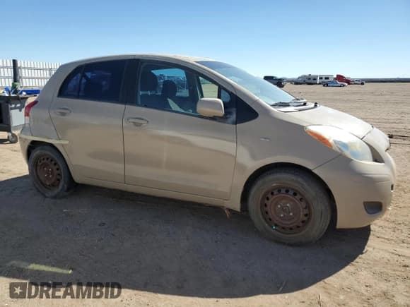 ✅ 2009 Toyota Yaris • VIN: JTDKT903095261501 • Lot: 82616345. Listed on Copart with 183,491 mi. Free auction sales archive from the USA and detailed vehicle history report at DreamBid. Image 4.