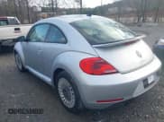 ✅ 2016 Volkswagen Beetle SE • VIN: 3VWJ17AT3GM606917 • Lot: 41728053. Wystawiony na IAAI z przebiegiem Nie podano. Bezpłatny archiwum sprzedaży aukcyjnych z USA i szczegółowy raport historii pojazdu na DreamBid. Zdjęcie 14.