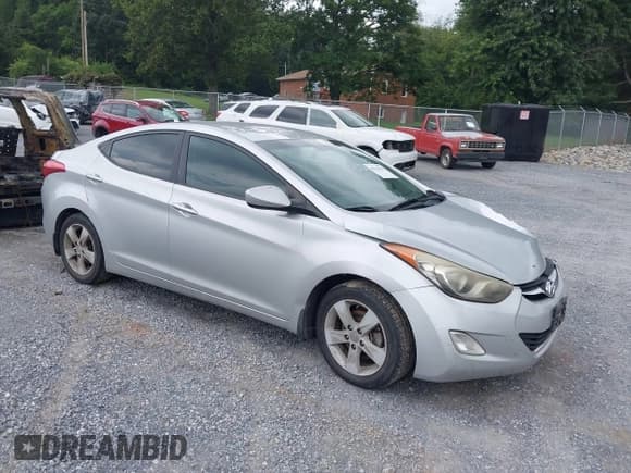 ✅ 2013 Hyundai Elantra GLS • VIN: KMHDH4AE8DU829579 • Lot: 42940329. Listed on IAAI with 153,115 mi. Free auction sales archive from the USA and detailed vehicle history report at DreamBid. Image 1.