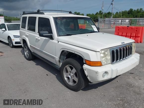 ✅ 2010 Jeep Commander Sport • VIN: 1J4RH4GK4AC140982 • Lot: 42344821. Listed on IAAI with 179,476 mi. Free auction sales archive from the USA and detailed vehicle history report at DreamBid. Image 1.
